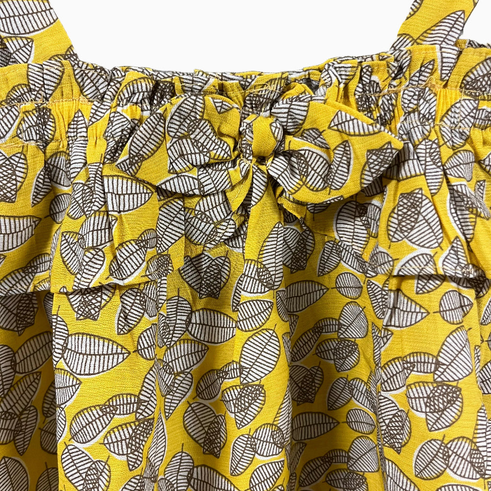 Mayoral top giallo senza spalle con fiocco e stampa a foglie bambina