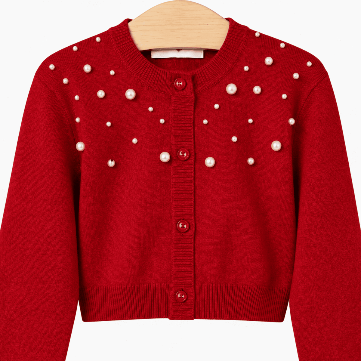 Dettaglio collo rotondo cardigan rosso perle tridimensionali texture costine