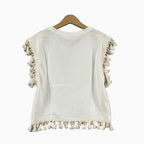 Please t-shirt bianca con frange e nappe boho-chic bambina