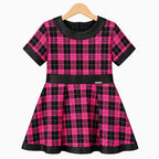 Abito corto tartan fucsia e nero con inserti ecopelle nera per bambina