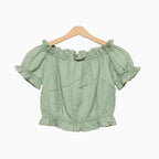 Mayoral top bambina verde salvia con laccetto e nappa